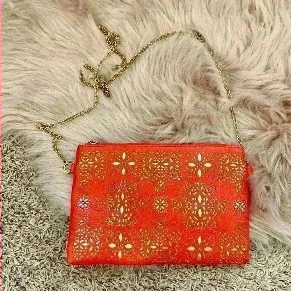 No Brand | Small orange & gold cross body purse  with gold strap